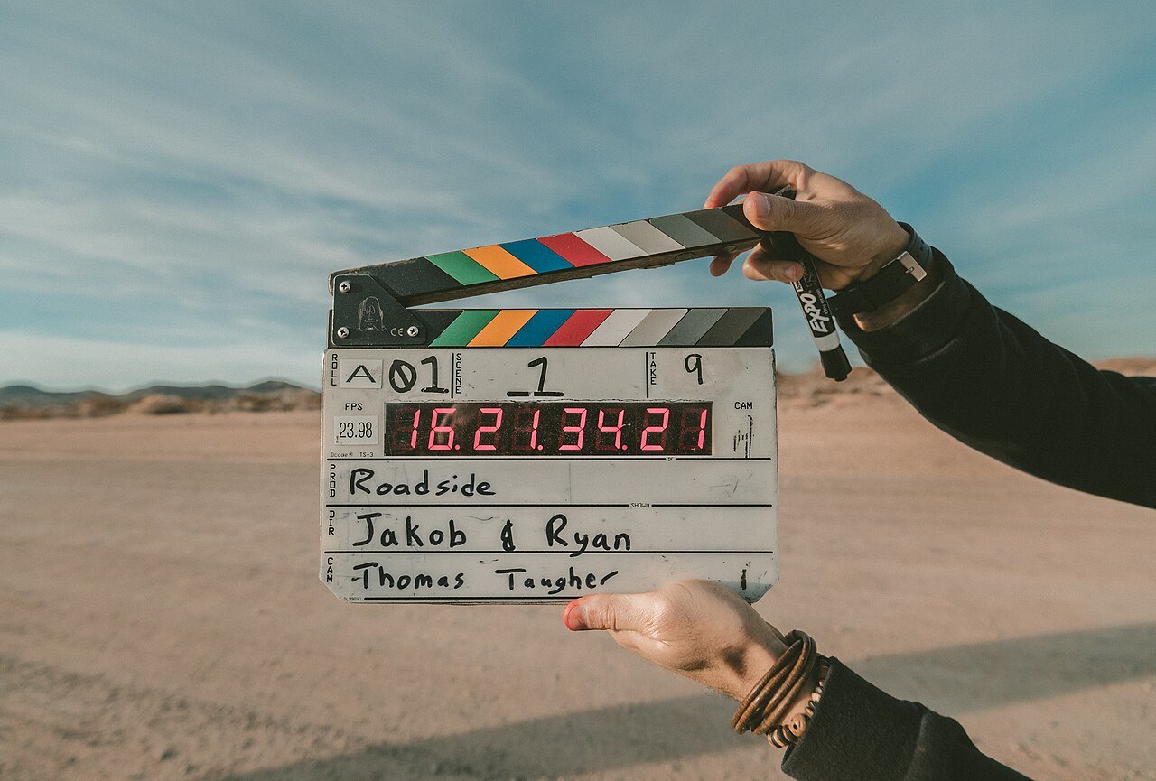 Clapperboard during an outdoor film shoot.