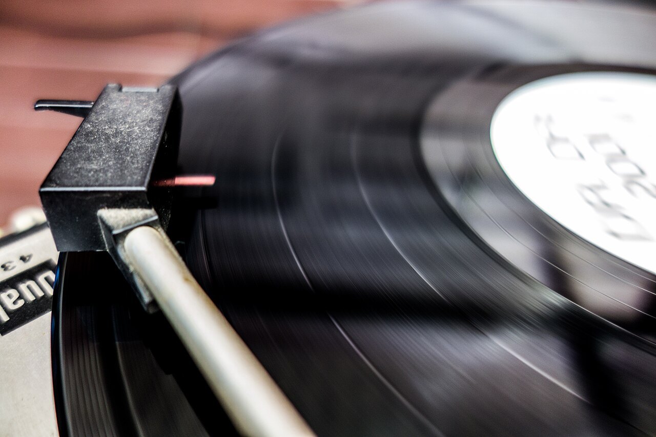 Record playing with the stylus resting in its groove.