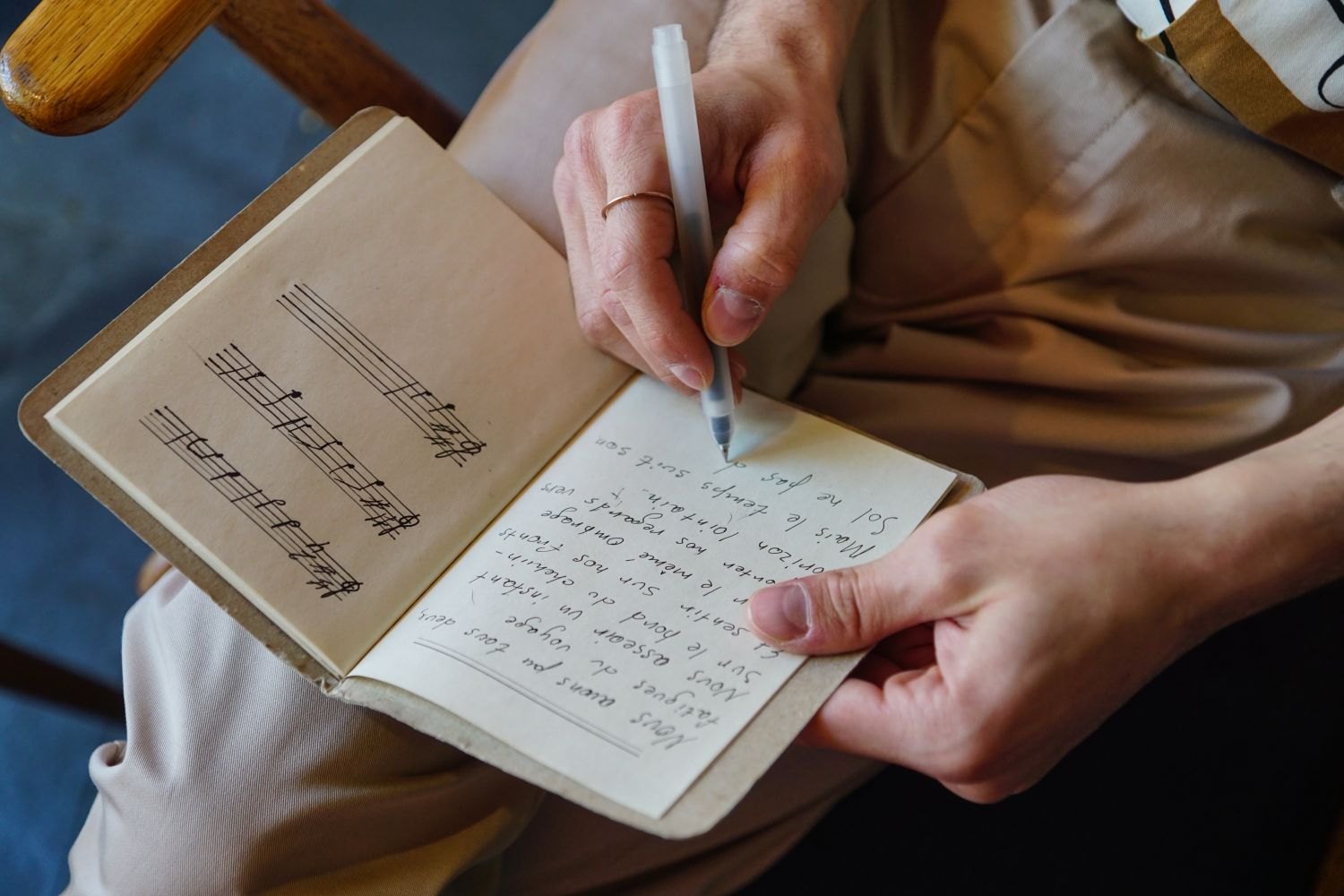 Handwritten notes during songwriting.