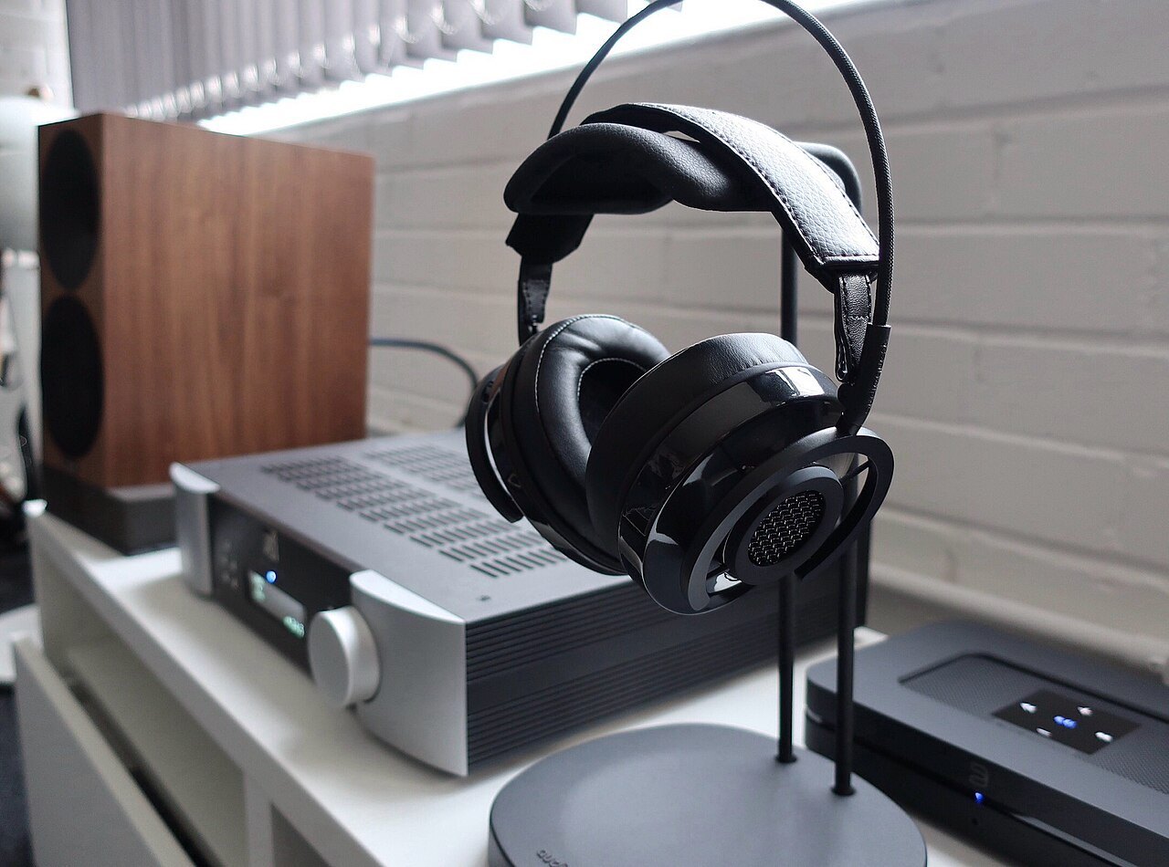 Headphones and an amplifier for listening to music.