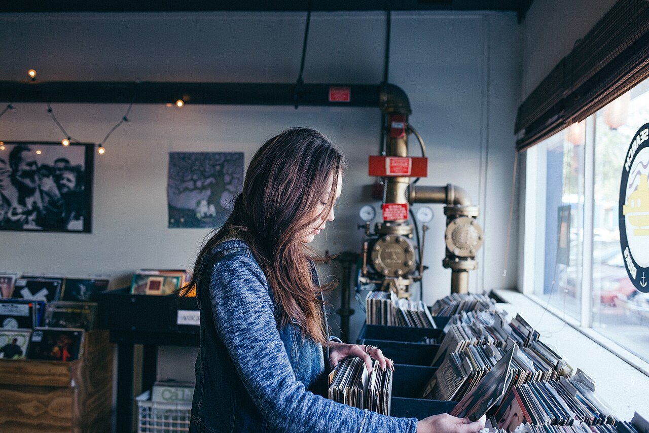 A person browsing record bins.