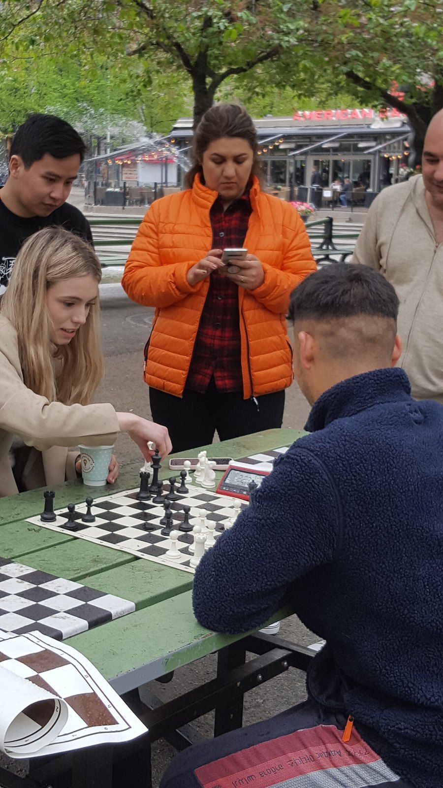 Two people playing a game of chess.