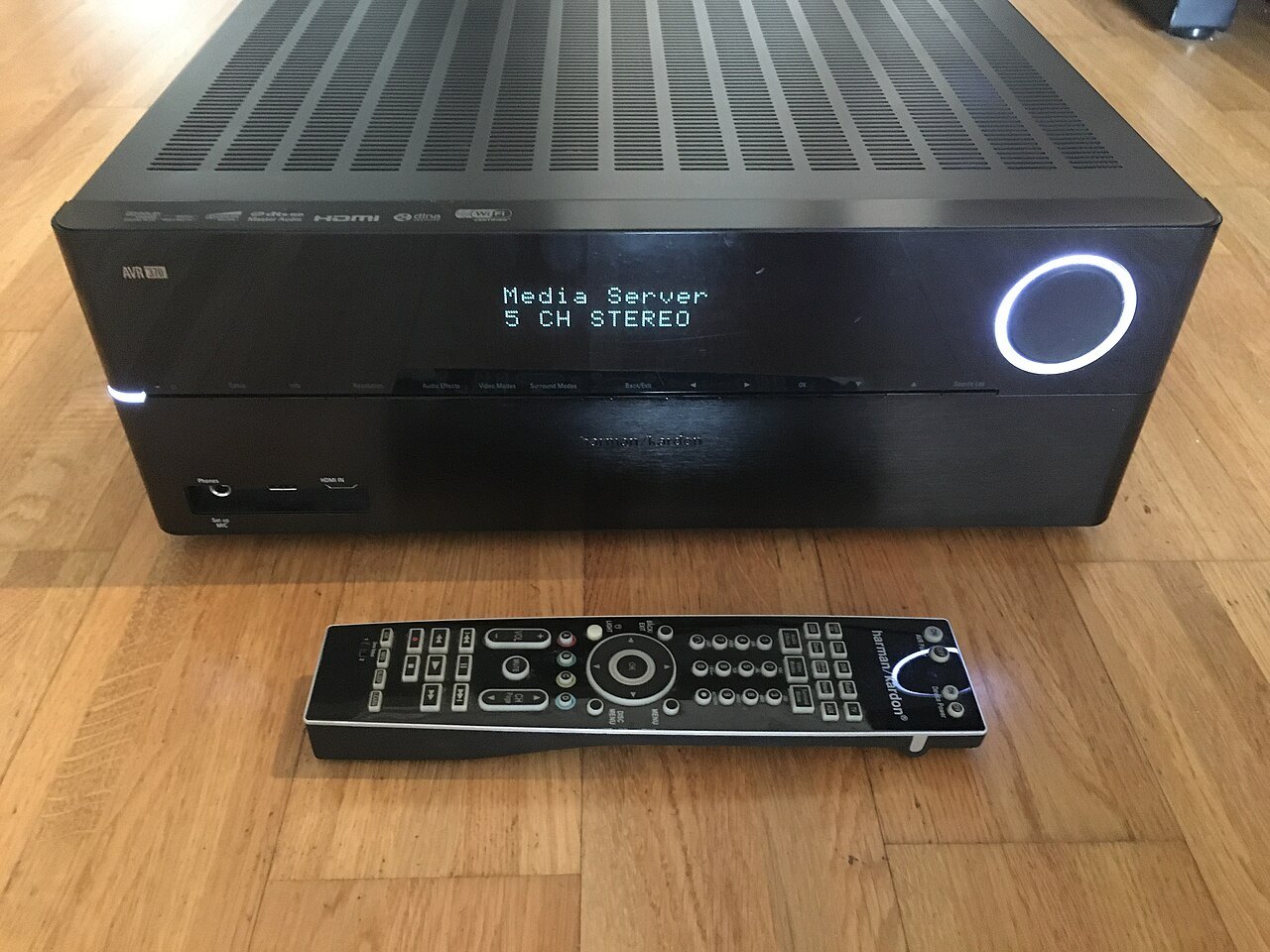 AV receiver with visible ventilation slots on its top panel.