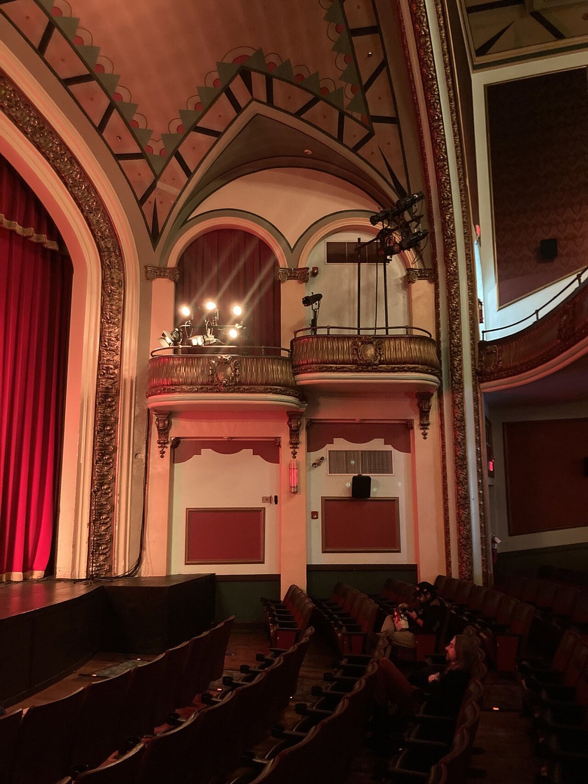 Side view of a theatre stage and balconies.