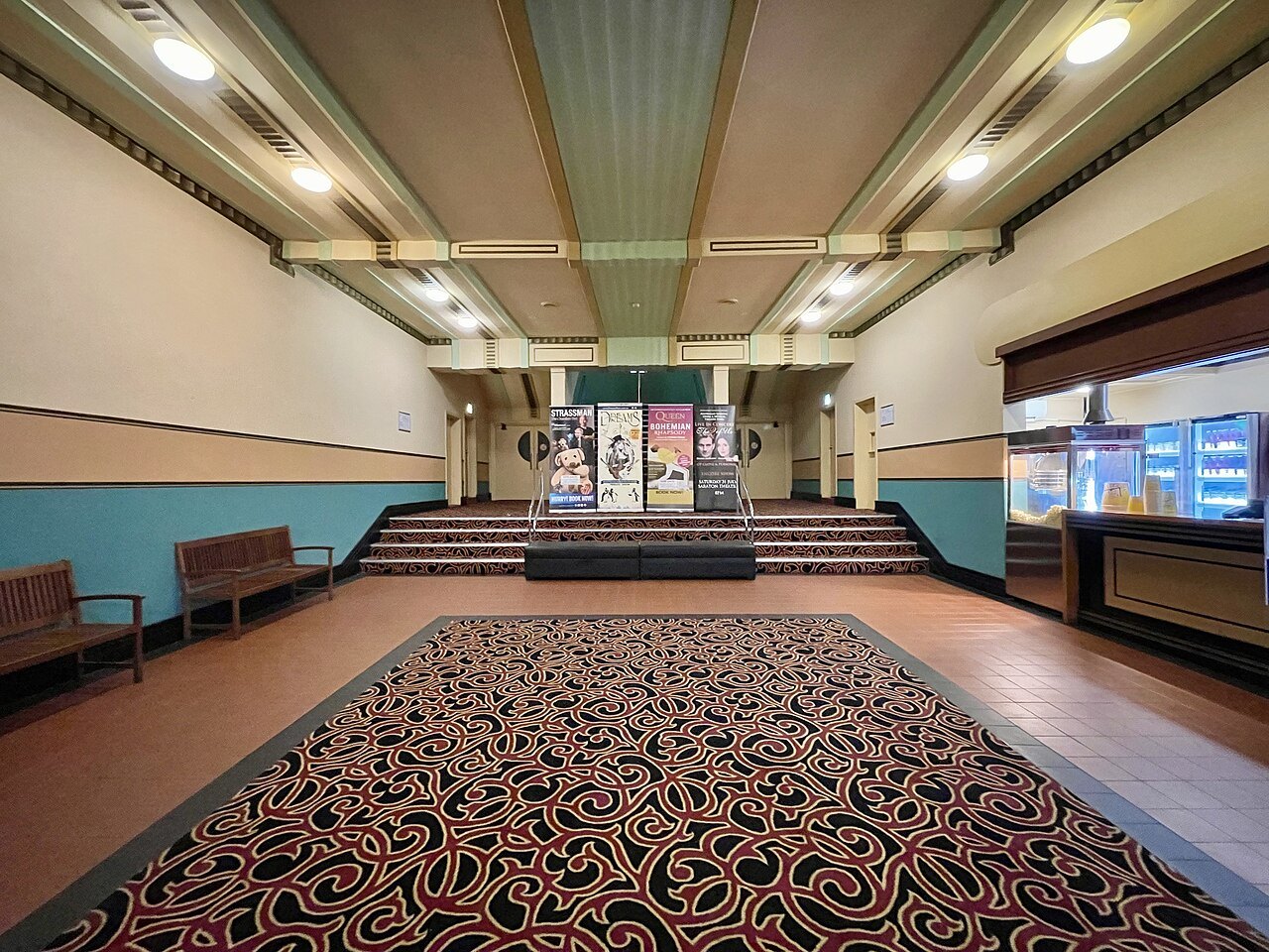 Theatre foyer with an entrance towards the auditorium.