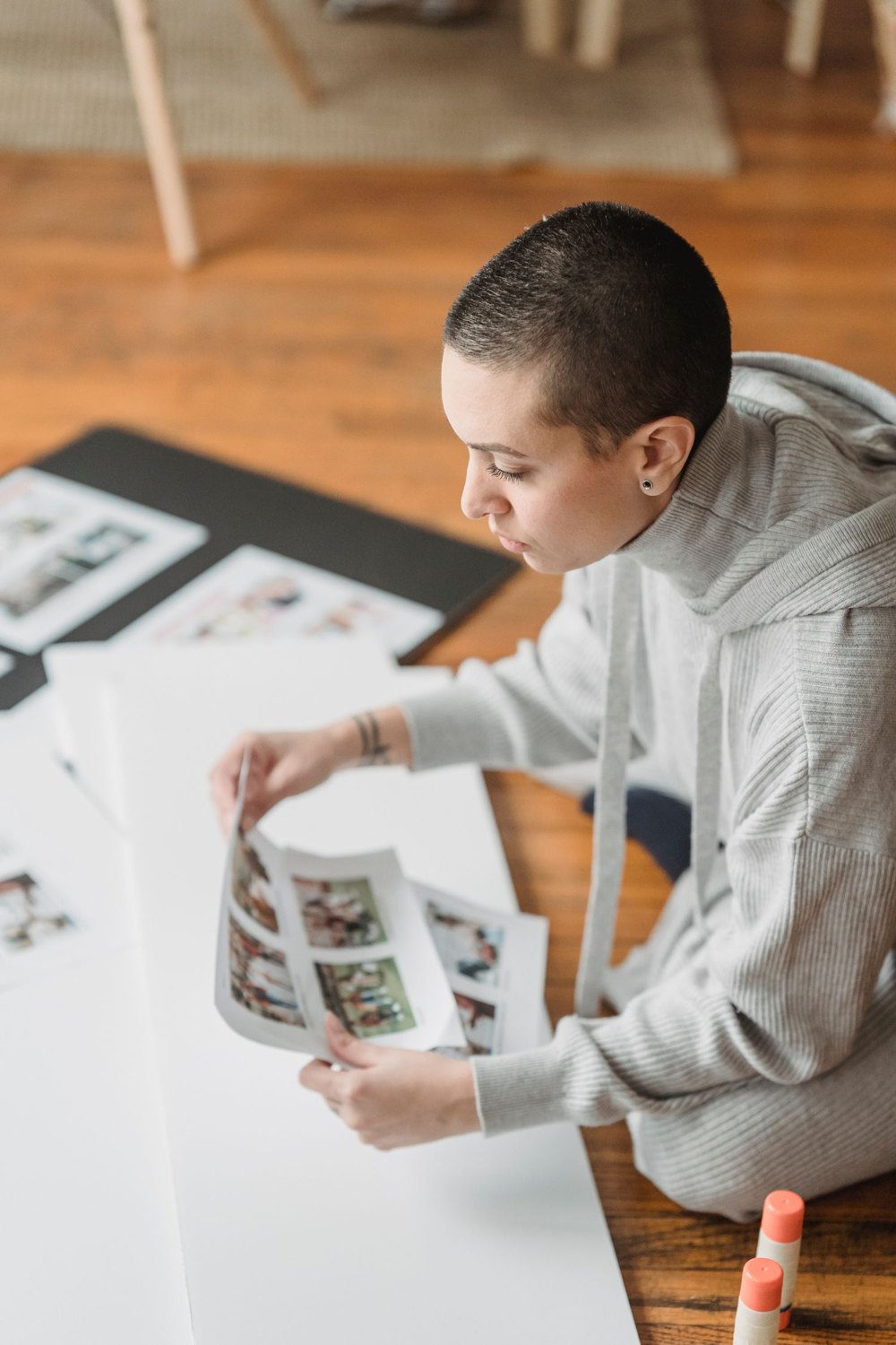 Photographs are arranged for a personal memory page.